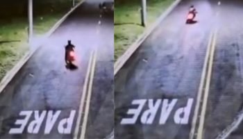 Suspeito deixando a delegacia. — Foto: Suspeito deixando a delegacia. (Foto: Leo