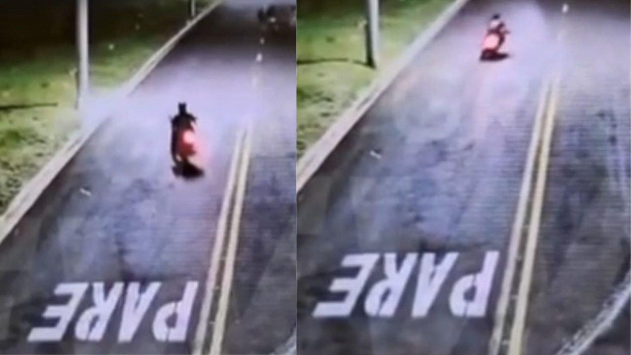 Suspeito deixando a delegacia. — Foto: Suspeito deixando a delegacia. (Foto: Leo