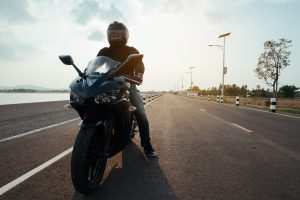 Rider Motorbike on the road riding. having fun driving the empty