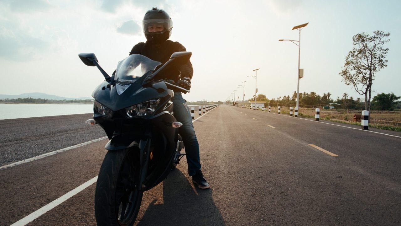 Rider Motorbike on the road riding. having fun driving the empty