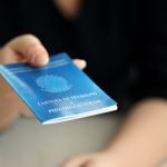 Woman,Boss,Gives,A,Brazilian,Work,Card,And,Social,Security