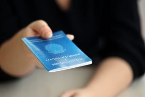 Woman,Boss,Gives,A,Brazilian,Work,Card,And,Social,Security