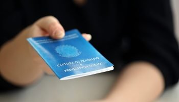 Woman,Boss,Gives,A,Brazilian,Work,Card,And,Social,Security